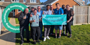 Residents of Charnwood House celebrating the Outstanding CQC rating 